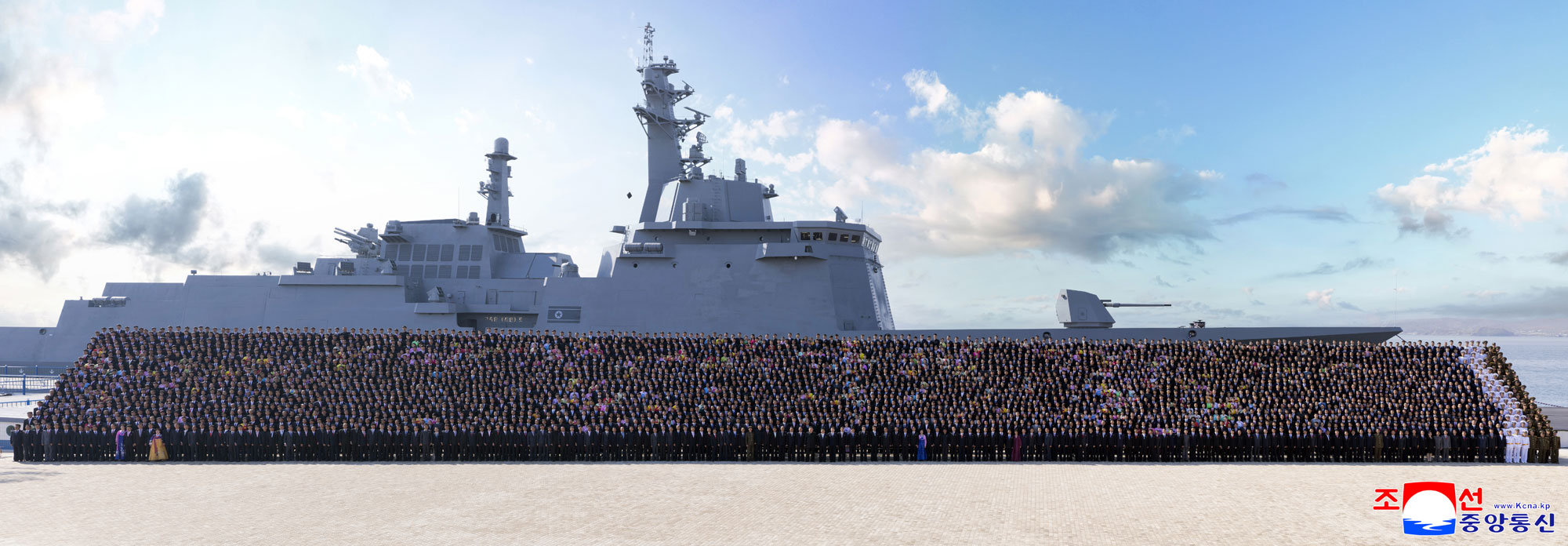 Respected Comrade Kim Jong Un has photo taken with workers of Nampho Shipyard and scientists and technicians in field of warship-building industry who made contribution to building new-type destroyer